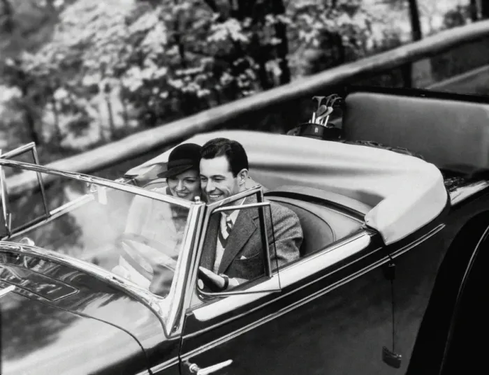 Framed Print : Young Couple in Vintage Soft Top Car with Golf Clubs on Back Seat Framed Print : Young Couple in Vintage Soft Top Car with Golf Clubs on Back Seat
