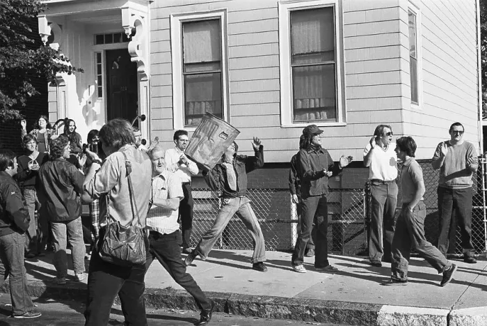 Framed Print : Young Demonstrator Heaves An Ash Can
