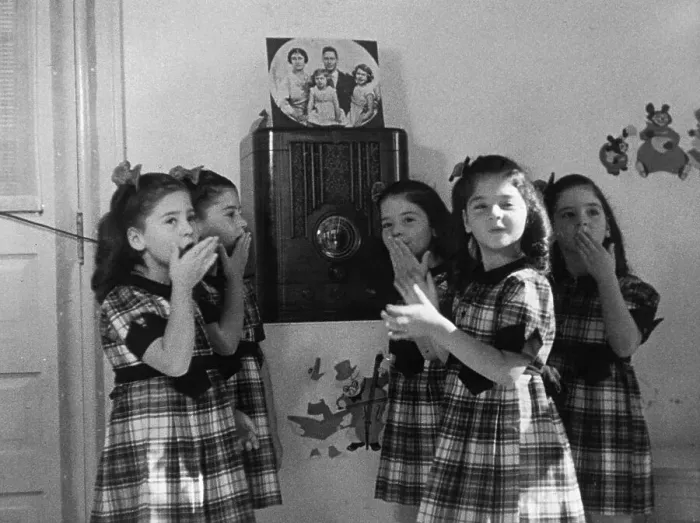 Framed Print : Young Dionne Quintuplets near Radio Framed Print : Young Dionne Quintuplets near Radio