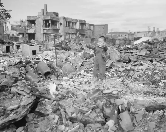 Framed Print : Young Distraught Korean Boy Amidst War Torn Neighborhood Framed Print : Young Distraught Korean Boy Amidst War Torn Neighborhood
