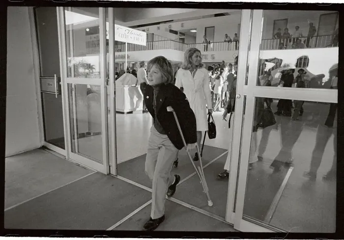 Framed Print : Young Edward Kennedy Jr. Walking on Crutches in Front of Joan Kennedy Framed Print : Young Edward Kennedy Jr. Walking on Crutches in Front of Joan Kennedy