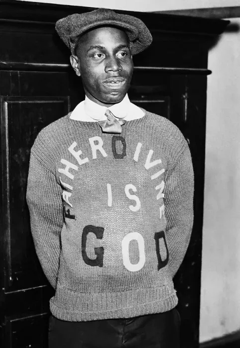 Framed Print : Young Father Divine Wearing Sweater with His Message