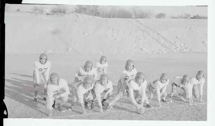 Framed Print : Young Football Players in Position for Game Framed Print : Young Football Players in Position for Game