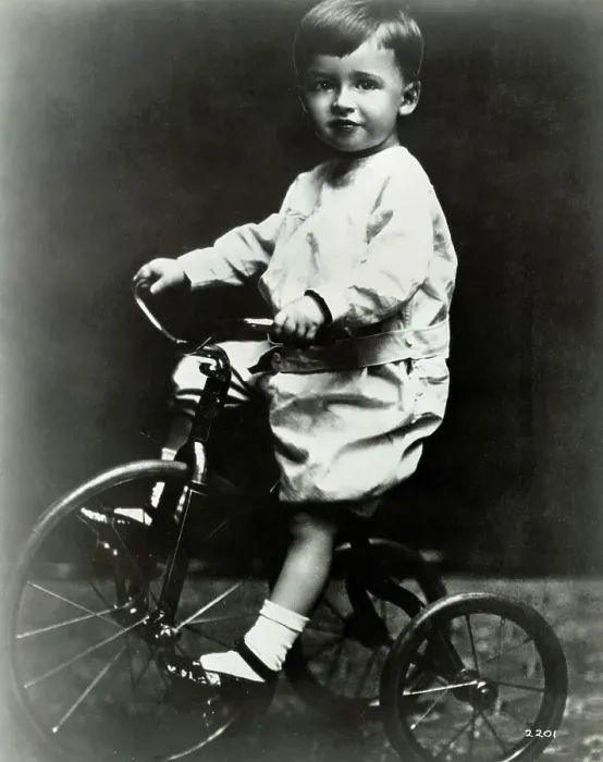 Framed Print : Young James Stewart Riding a Tricycle