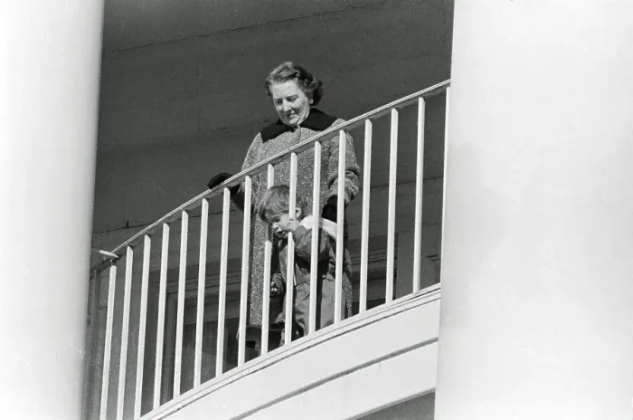 Framed Print : Young John F. Kennedy Jr. Peeping at His Father from Balcony Framed Print : Young John F. Kennedy Jr. Peeping at His Father from Balcony