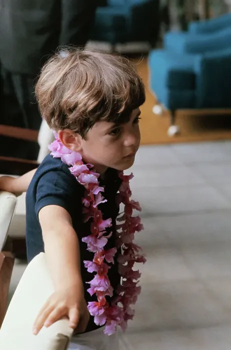 Framed Print : Young John F. Kennedy Jr. Standing on Balcony and Wearing a Lei Framed Print : Young John F. Kennedy Jr. Standing on Balcony and Wearing a Lei