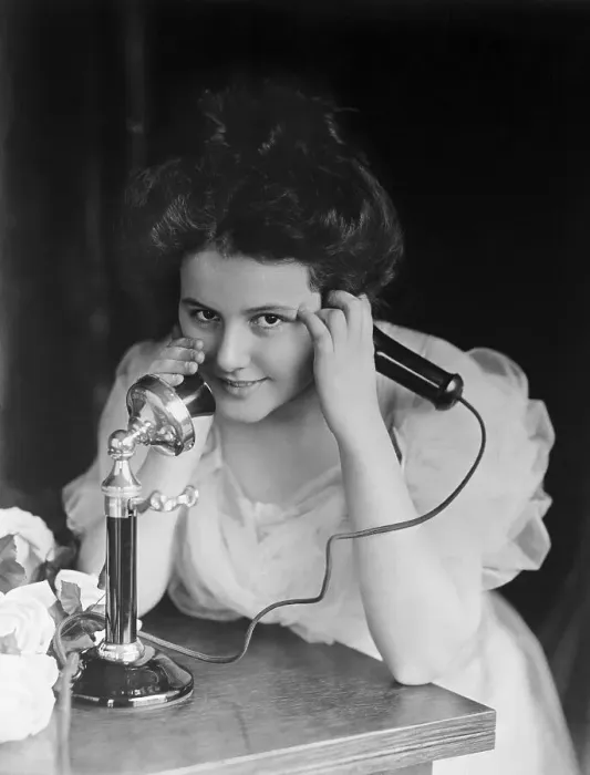 Framed Print : Young Lady Using Telephone Framed Print : Young Lady Using Telephone