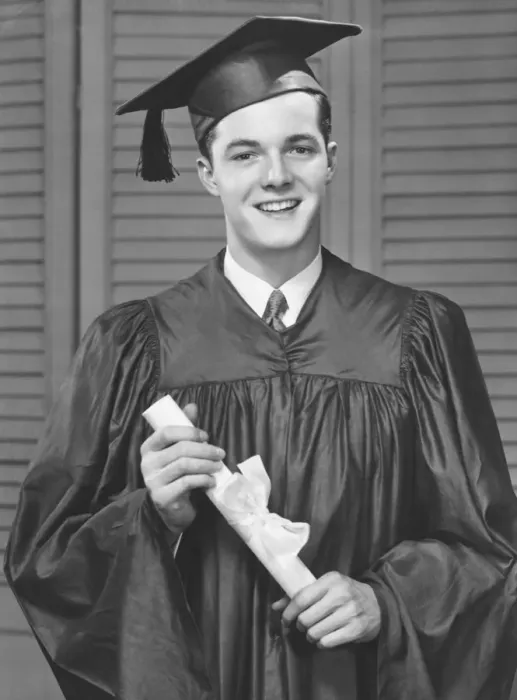 Framed Print : Young male university graduate holding diploma, (B&W), portrait Framed Print : Young male university graduate holding diploma, (B&W), portrait