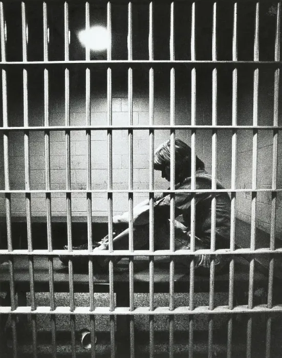 Framed Print : Young Man Behind Bars Framed Print : Young Man Behind Bars