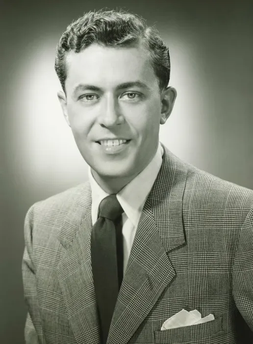 Framed Print : Young man in checked jacket posing in studio, (B&W), (Close-up), (Portrait) Framed Print : Young man in checked jacket posing in studio, (B&W), (Close-up), (Portrait)