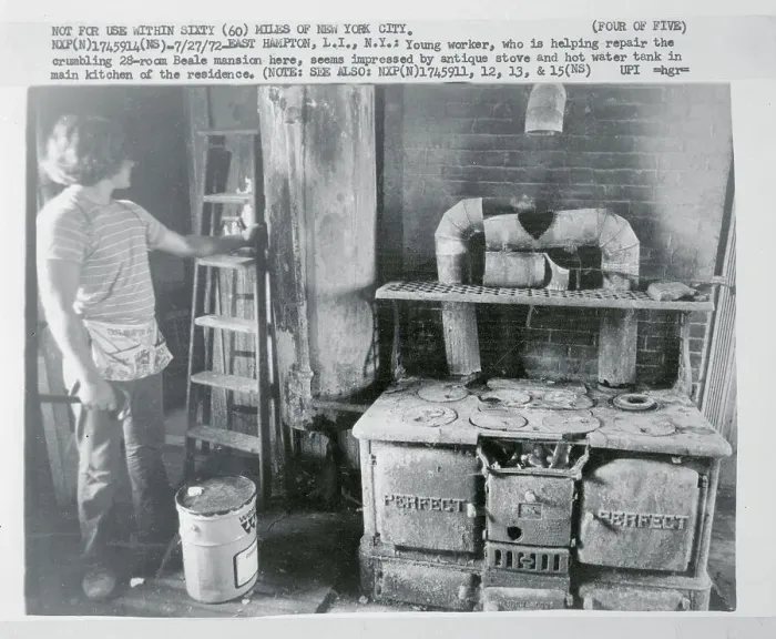 Framed Print : Young Man Near Ladder and Old Stove