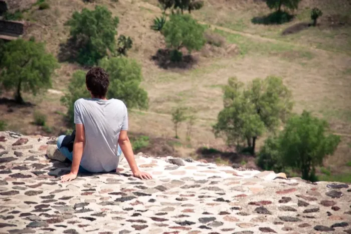Framed Print : Young man relaxing on a pyramid in Teotihuacan Framed Print : Young man relaxing on a pyramid in Teotihuacan