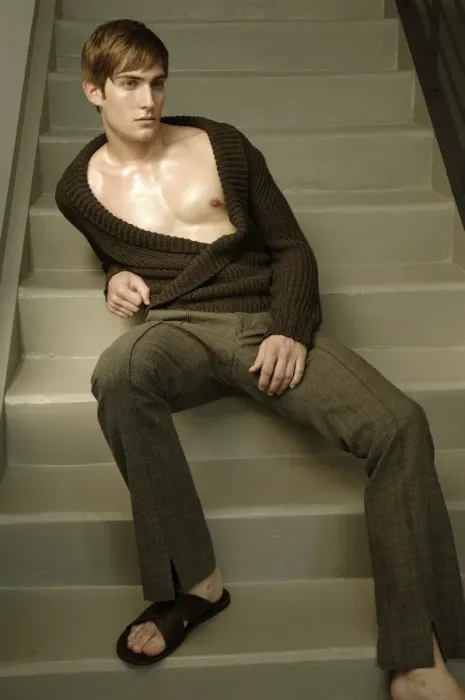 Framed Print : Young man sitting on the stairs Framed Print : Young man sitting on the stairs