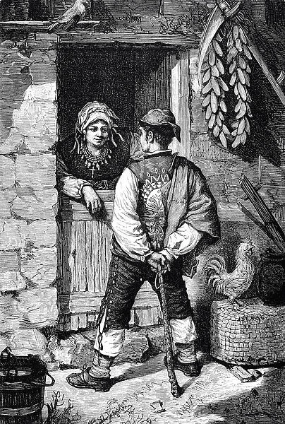 Young man talking to a young woman at the door, Spain