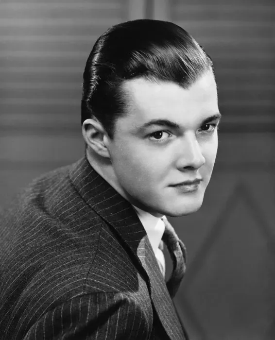 Framed Print : Young man wearing pinstripe jacket, (B&W), portrait Framed Print : Young man wearing pinstripe jacket, (B&W), portrait