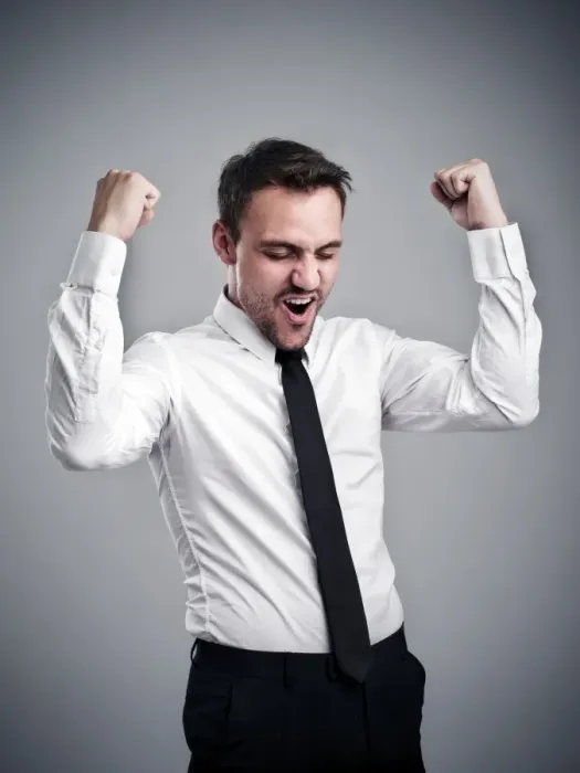 Framed Print : Young man wearing a shirt and a tie, cheering, success, victory pose Framed Print : Young man wearing a shirt and a tie, cheering, success, victory pose