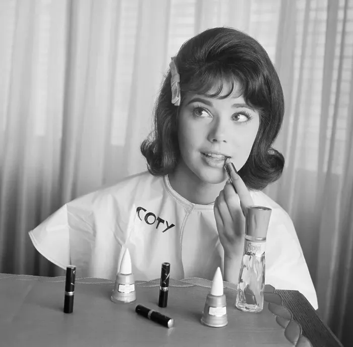 Framed Print : Young Model Applying Makeup Framed Print : Young Model Applying Makeup