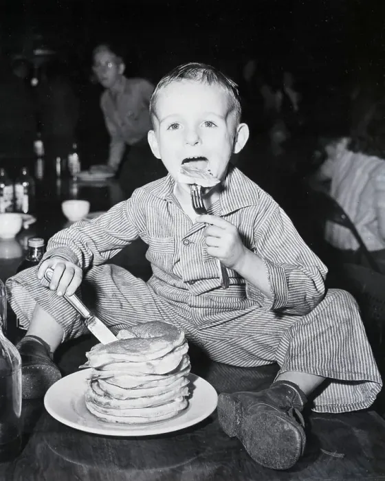 Framed Print : Young Pancake Eater-Pancake Festival Framed Print : Young Pancake Eater-Pancake Festival