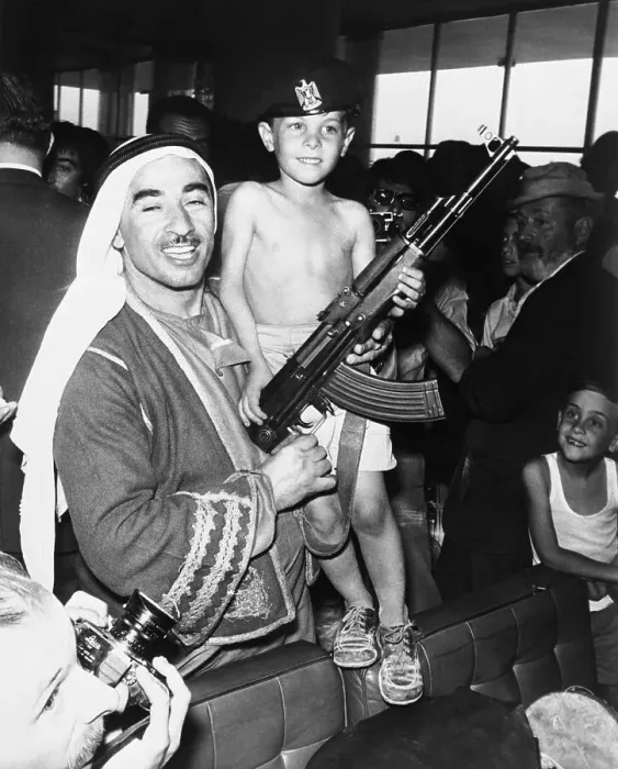 Framed Print : Young Passenger of Hijacked Jet Holding Rifle Framed Print : Young Passenger of Hijacked Jet Holding Rifle