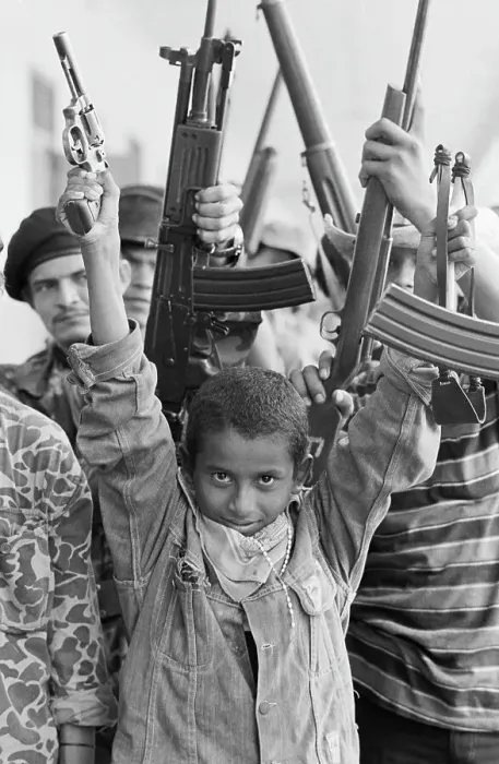 Framed Print : Young Sandinista With Gun And Slingshot