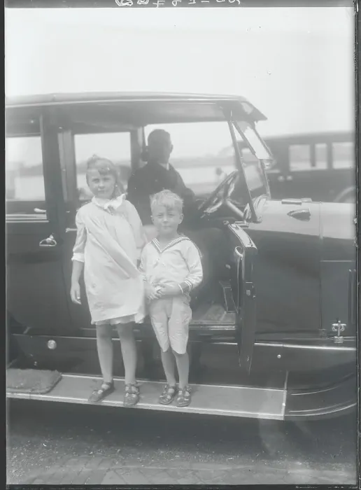 Framed Print : Young Socialites next to Chauffeured Automobile Framed Print : Young Socialites next to Chauffeured Automobile
