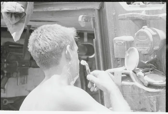 Framed Print : Young Soldier Shaving