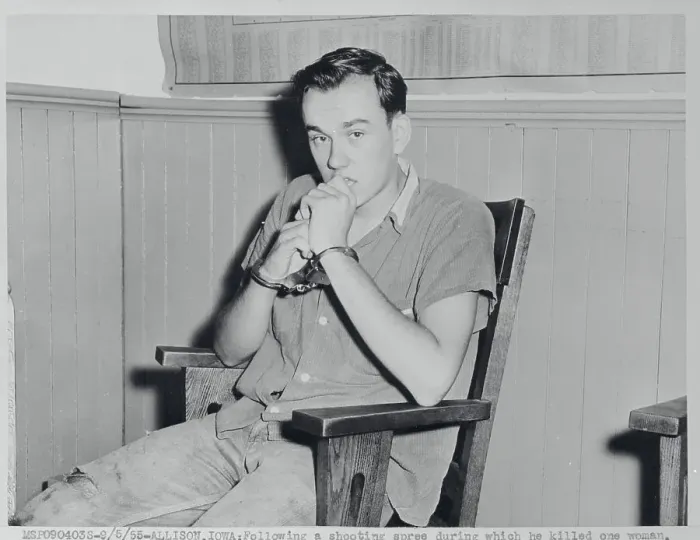 Framed Print : Young Suspect Pensively Reclining at Station Framed Print : Young Suspect Pensively Reclining at Station