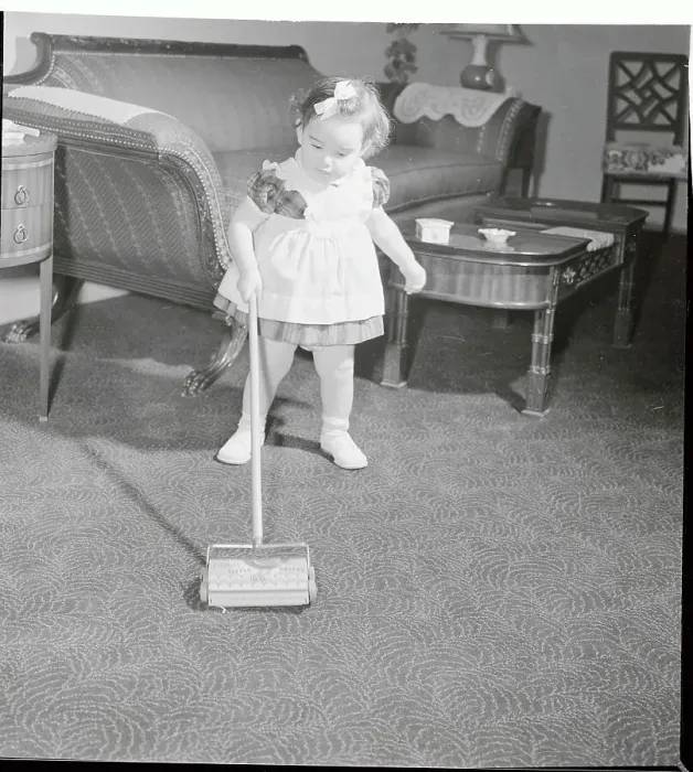 Framed Print : Young Toddler Using Her Toy Floor Sweeper