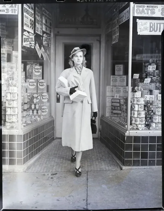 Framed Print : Young Woman Coming Out Of Grocery Framed Print : Young Woman Coming Out Of Grocery