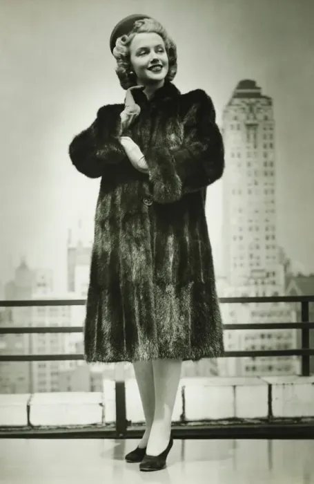Framed Print : Young woman in fur coat standing outdoors, (B&W) Framed Print : Young woman in fur coat standing outdoors, (B&W)