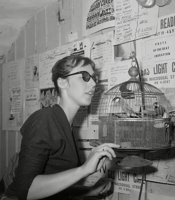 Framed Print : Young Woman at Gaslight Feeding Birds in Hanging Cage Framed Print : Young Woman at Gaslight Feeding Birds in Hanging Cage