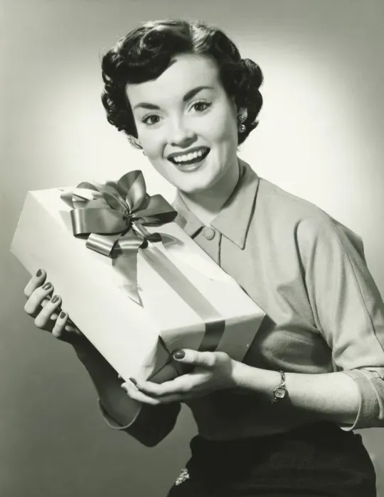 Framed Print : Young woman holding present, (B&W), portrait Framed Print : Young woman holding present, (B&W), portrait