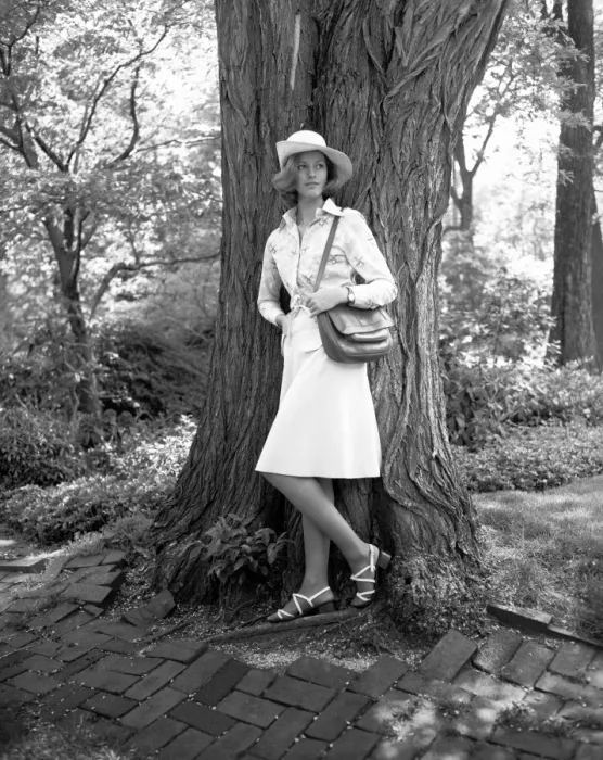 Framed Print : Young woman leaning by tree, (B&W)