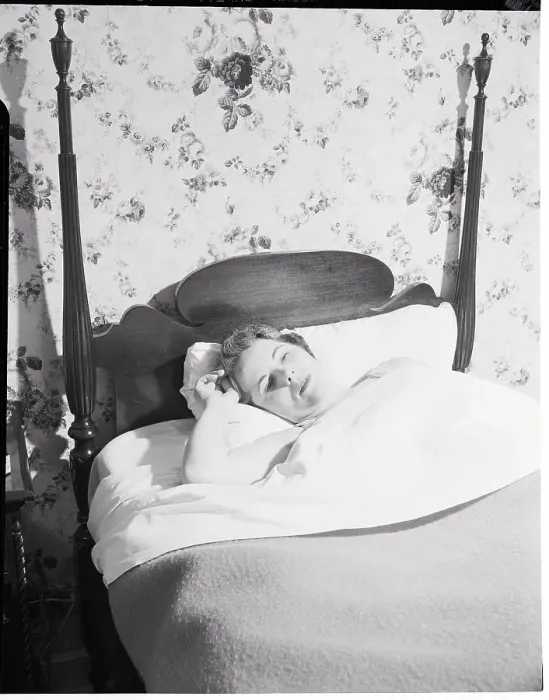 Framed Print : Young Woman Lying in Bed Framed Print : Young Woman Lying in Bed