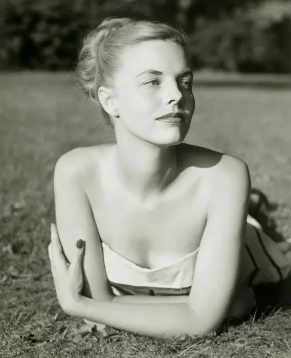 Framed Print : Young woman lying on grass Framed Print : Young woman lying on grass