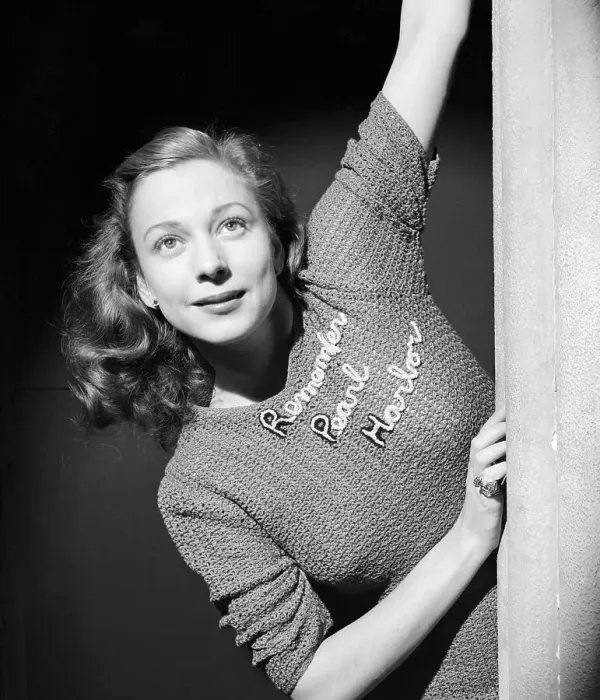 Framed Print : Young Woman Modeling National Slogan on Her Sweater Framed Print : Young Woman Modeling National Slogan on Her Sweater
