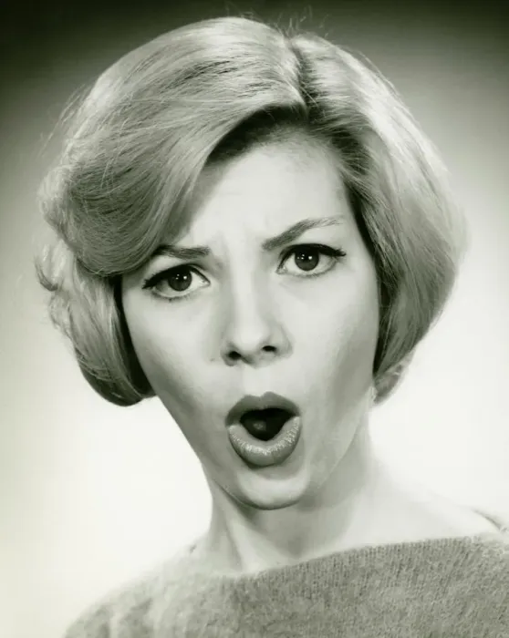 Framed Print : Young woman with open mouth in studio, (B&W), (Portrait) Framed Print : Young woman with open mouth in studio, (B&W), (Portrait)
