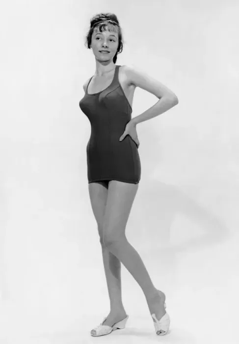 Framed Print : Young woman poses in bathing suit Framed Print : Young woman poses in bathing suit