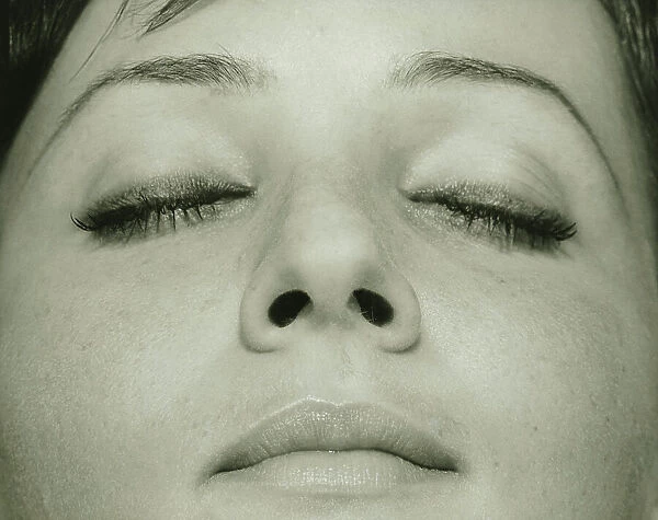 Young woman posing, close-up of face, (B&W)