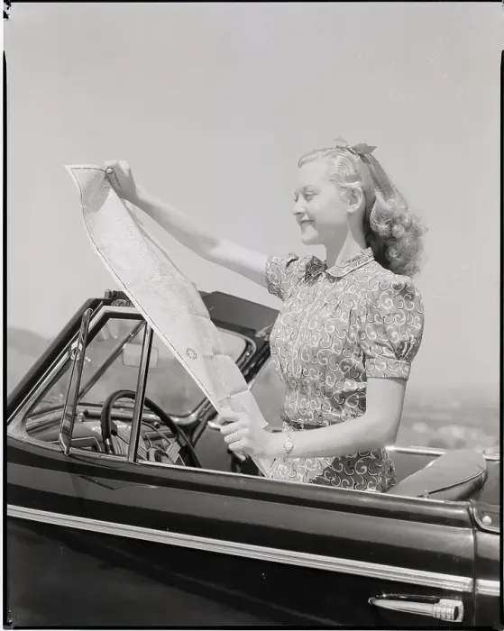 Framed Print : Young Woman Reading Road Map Framed Print : Young Woman Reading Road Map
