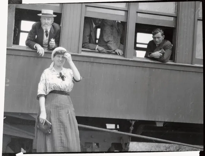 Framed Print : Young Woman Standing Near Train Window Framed Print : Young Woman Standing Near Train Window