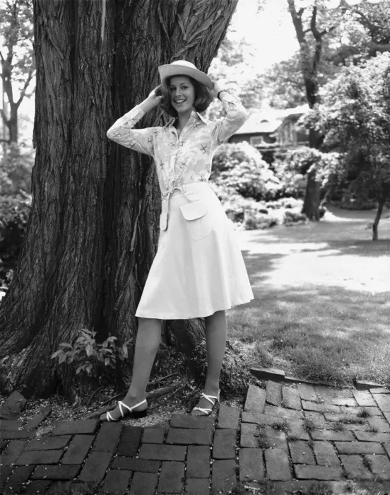 Framed Print : Young woman standing by tree in park, (B&W), portrait Framed Print : Young woman standing by tree in park, (B&W), portrait