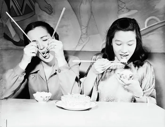 Framed Print : Young Women Eating Chinese Food Framed Print : Young Women Eating Chinese Food