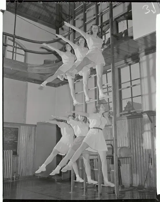 Framed Print : Young Women Exercising in Unison Framed Print : Young Women Exercising in Unison