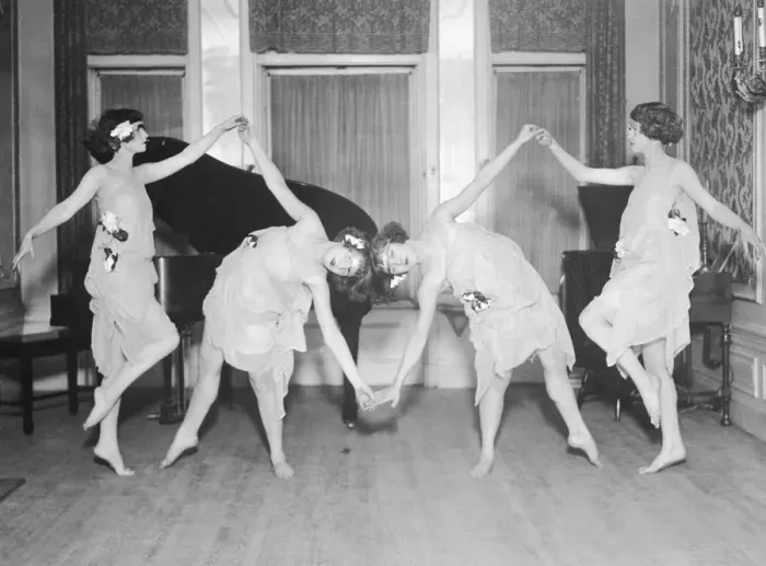 Framed Print : Four young women performing modern dance (B&W) Framed Print : Four young women performing modern dance (B&W)