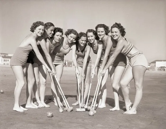 Framed Print : Young Women Playing Beach Croquet Framed Print : Young Women Playing Beach Croquet