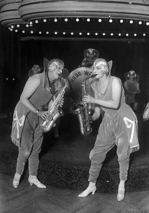 Framed Print : Young Women Playing Saxophones Framed Print : Young Women Playing Saxophones