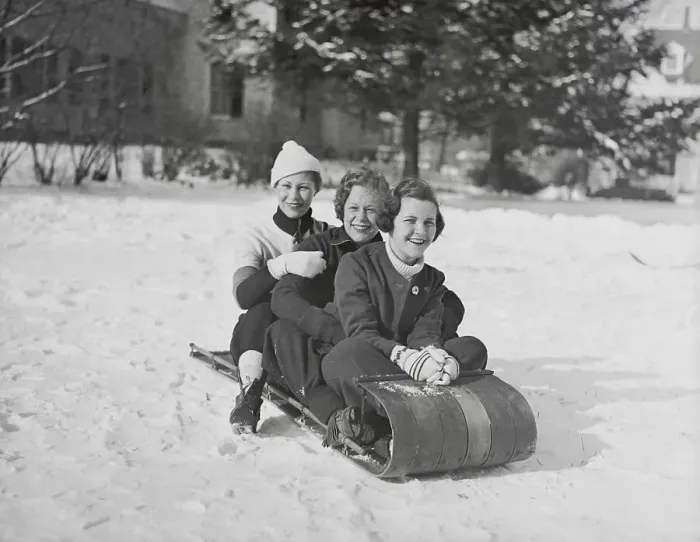 Framed Print : Young Women Riding on Sled Framed Print : Young Women Riding on Sled