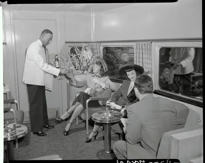 Framed Print : Young Women Being Served in Train Lounge Car Framed Print : Young Women Being Served in Train Lounge Car