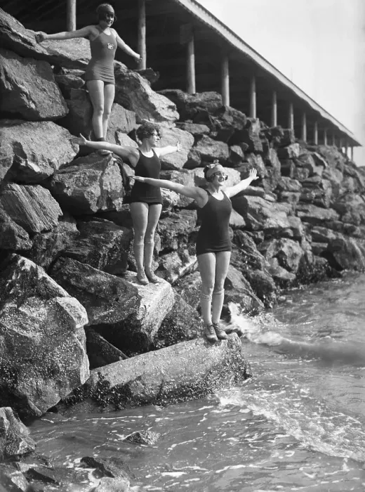 Framed Print : Young women standing on coastline Framed Print : Young women standing on coastline